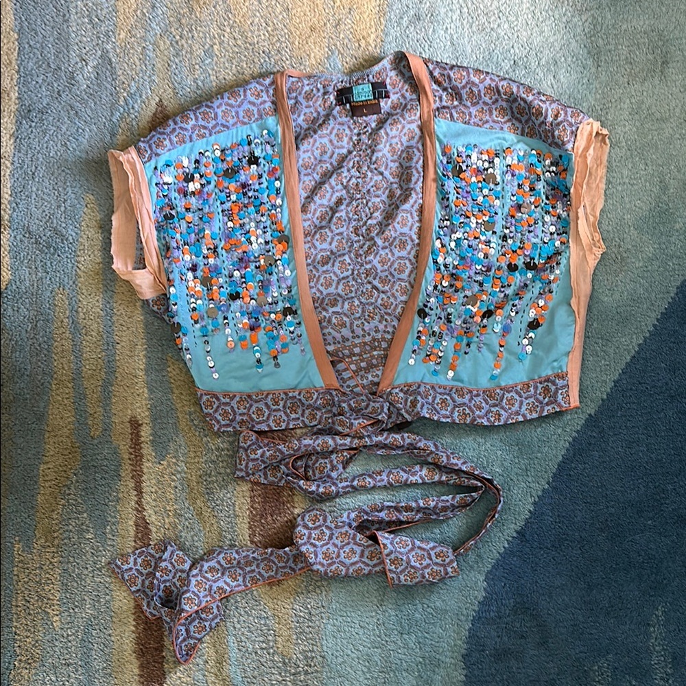 A common thread sequin wrap top